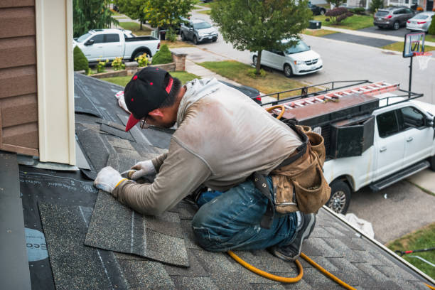 Professional Flat Roof Repair technician working in Fayette, MS